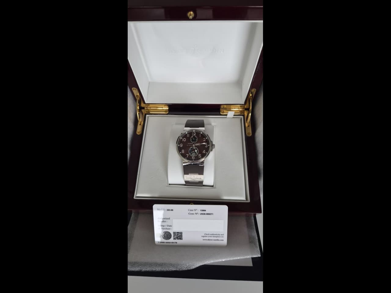 Käekell kirjega Ulysse Nardin
